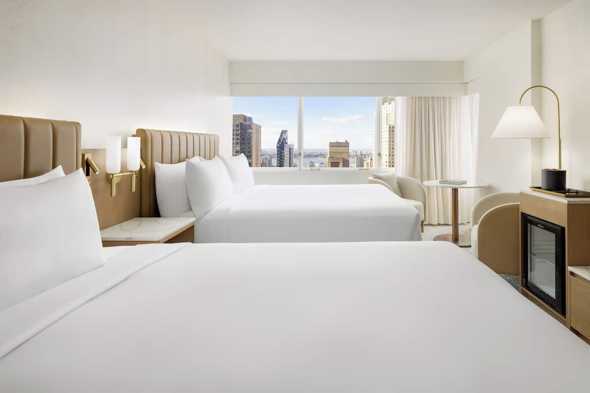 Premium bedding, down comforters, pillowtop beds, in-room safe