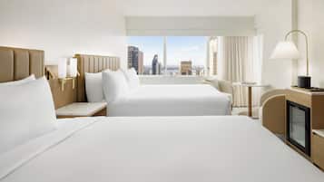 Premium bedding, down comforters, pillowtop beds, in-room safe