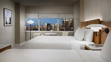 Premium bedding, down duvets, pillow-top beds, in-room safe