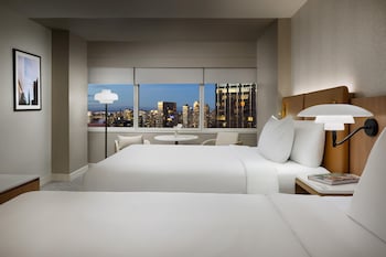 Premium bedding, down comforters, pillowtop beds, in-room safe at Hyatt Regency Times Square