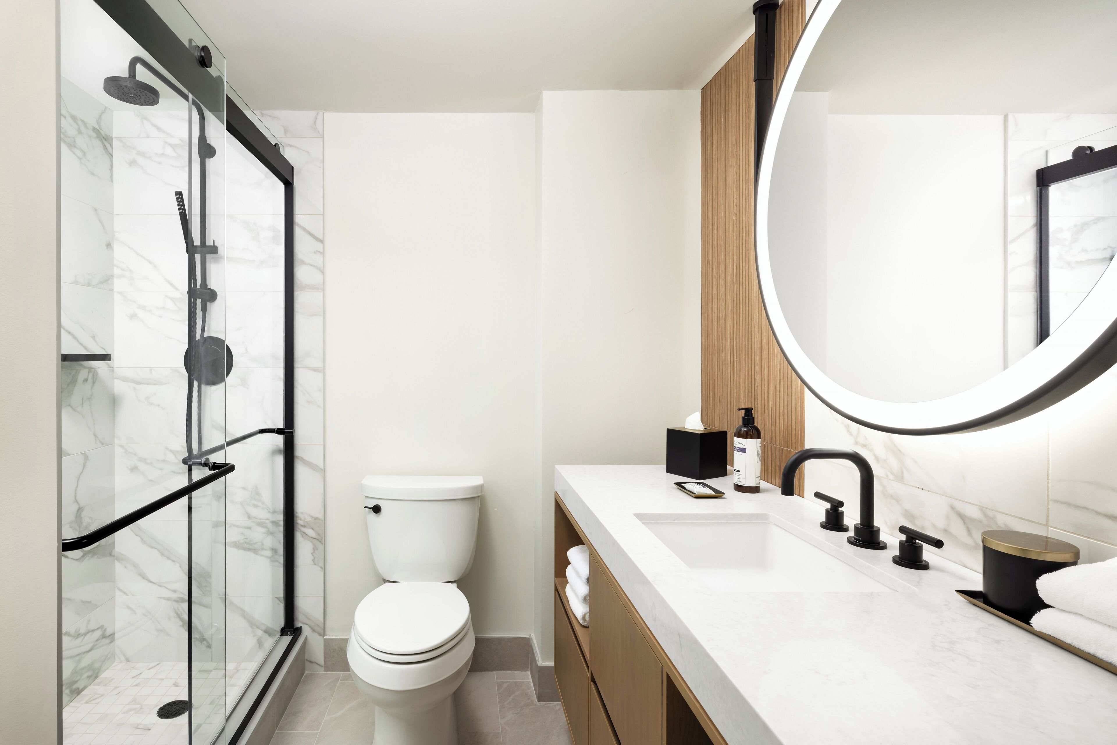 room, 1 king bed, corner | bathroom | designer toiletries, hair dryer, towels, soap