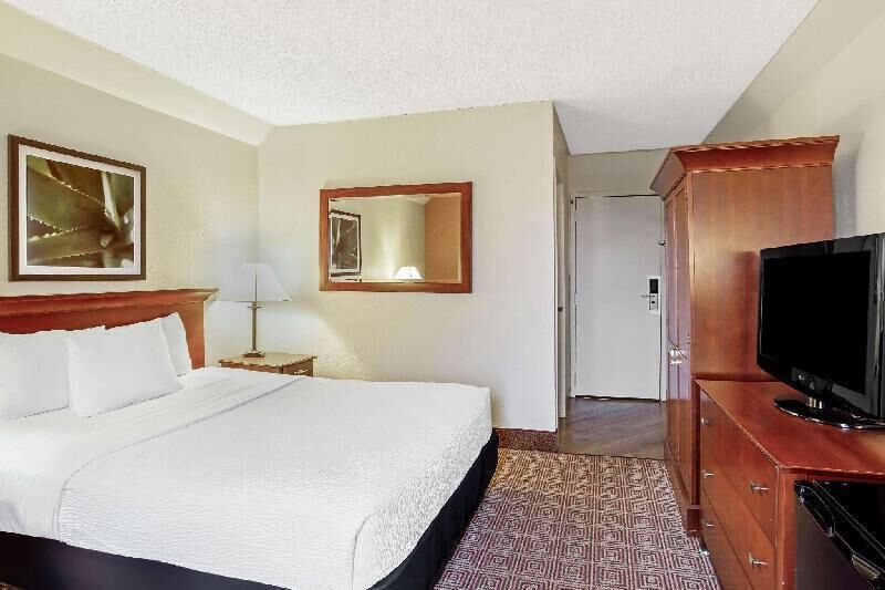 Premium bedding, desk, blackout curtains, iron/ironing board