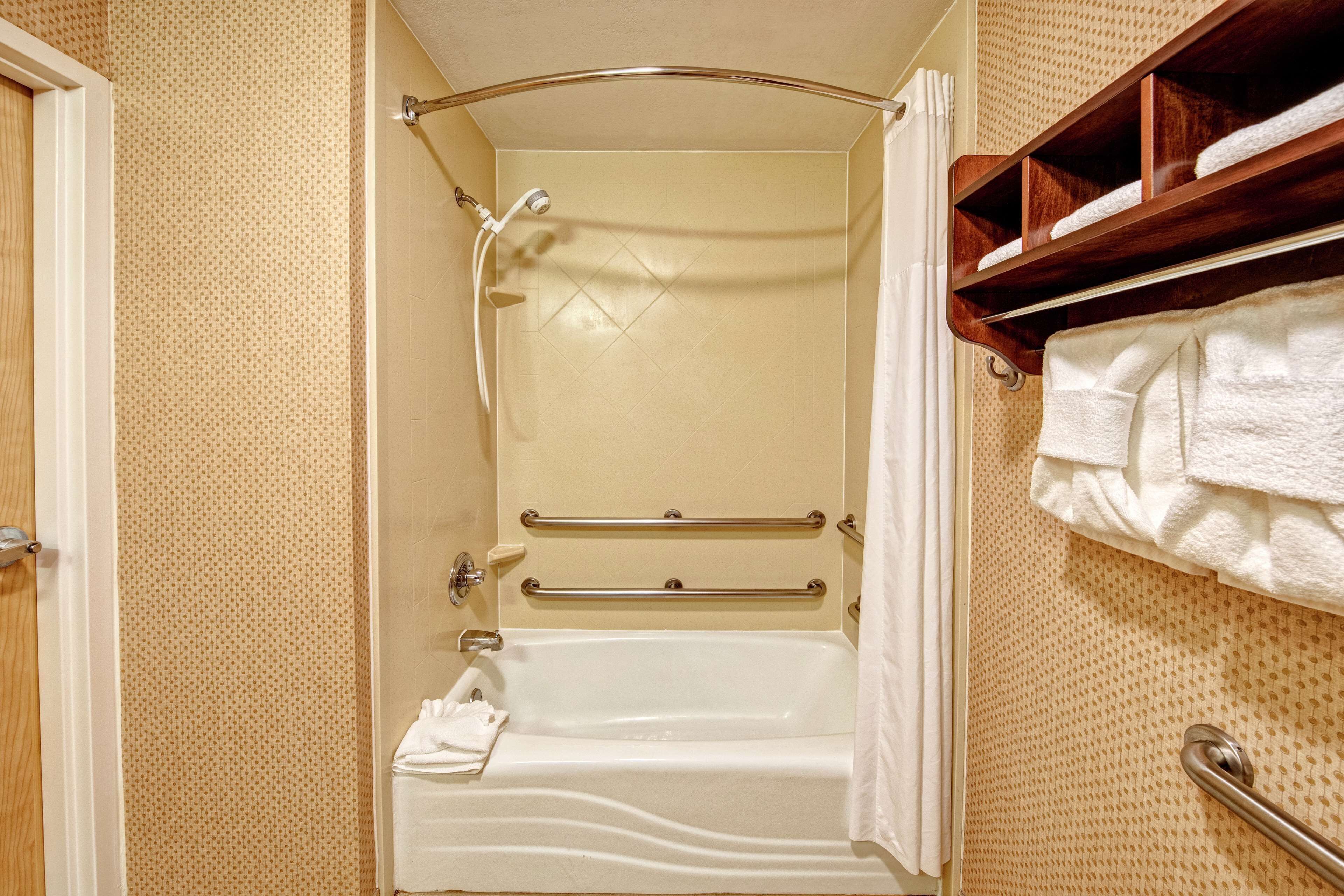 Bathroom | Bathtub, hair dryer, towels, soap