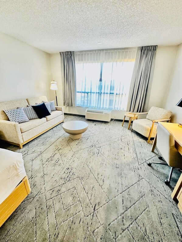 Pillow-top beds, desk, blackout curtains, iron/ironing board