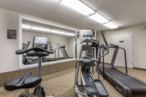 A fitness center with treadmills, an elliptical, and a stationary bike. - Days Inn by Wyndham Harrisburg North (Harrisburg)