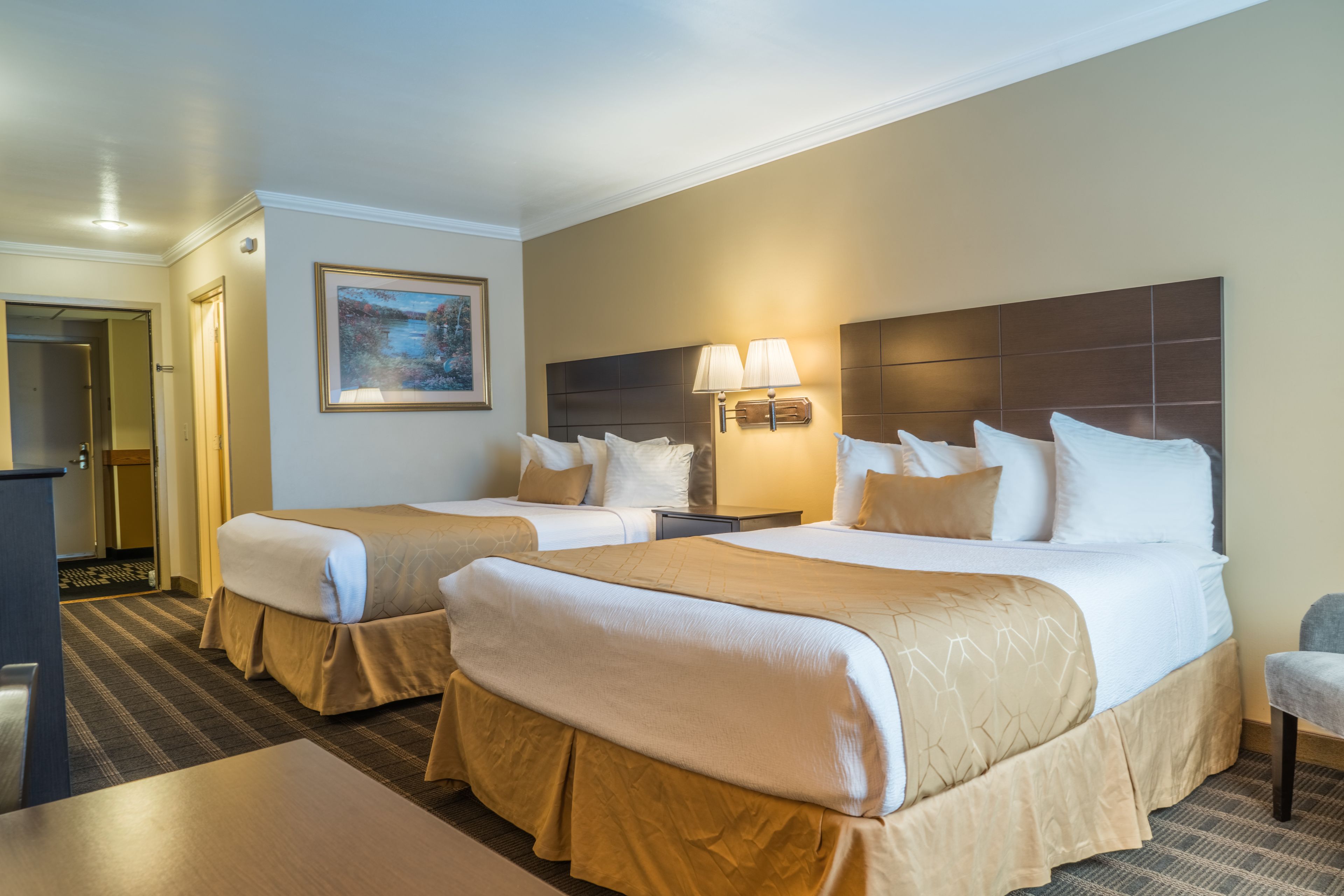 standard room, 2 queen beds, non smoking, refrigerator & microwave | desk, laptop workspace, iron/ironing board, free cots/infant beds