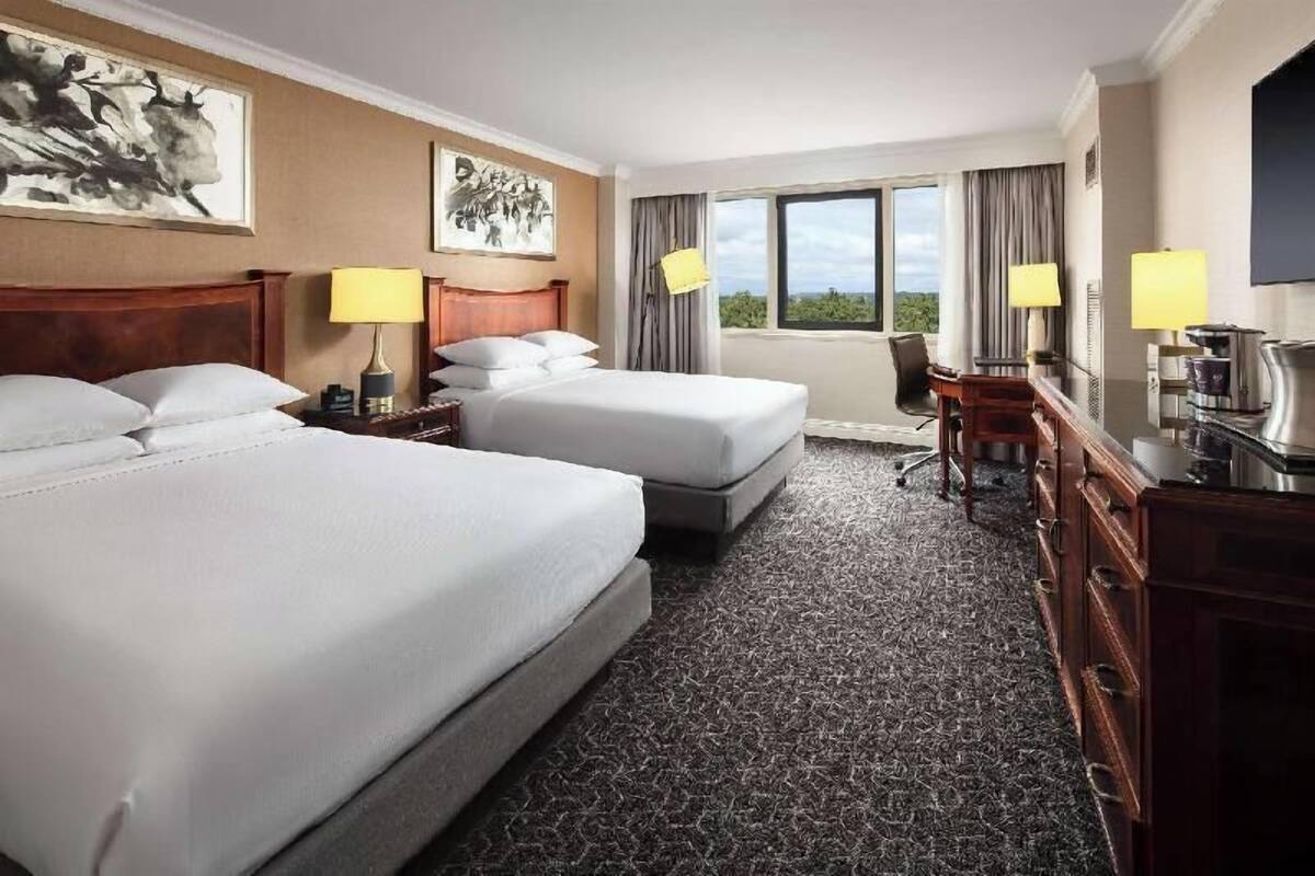 Premium bedding, down comforters, pillowtop beds, in-room safe