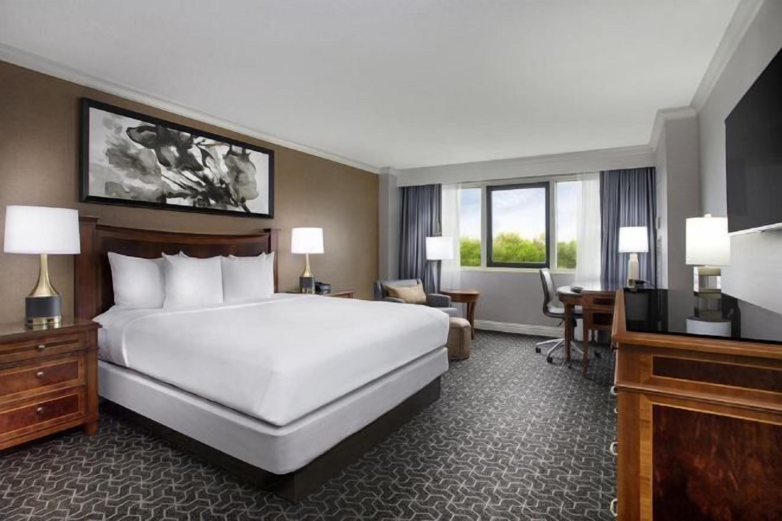 Premium bedding, down duvets, pillow-top beds, in-room safe