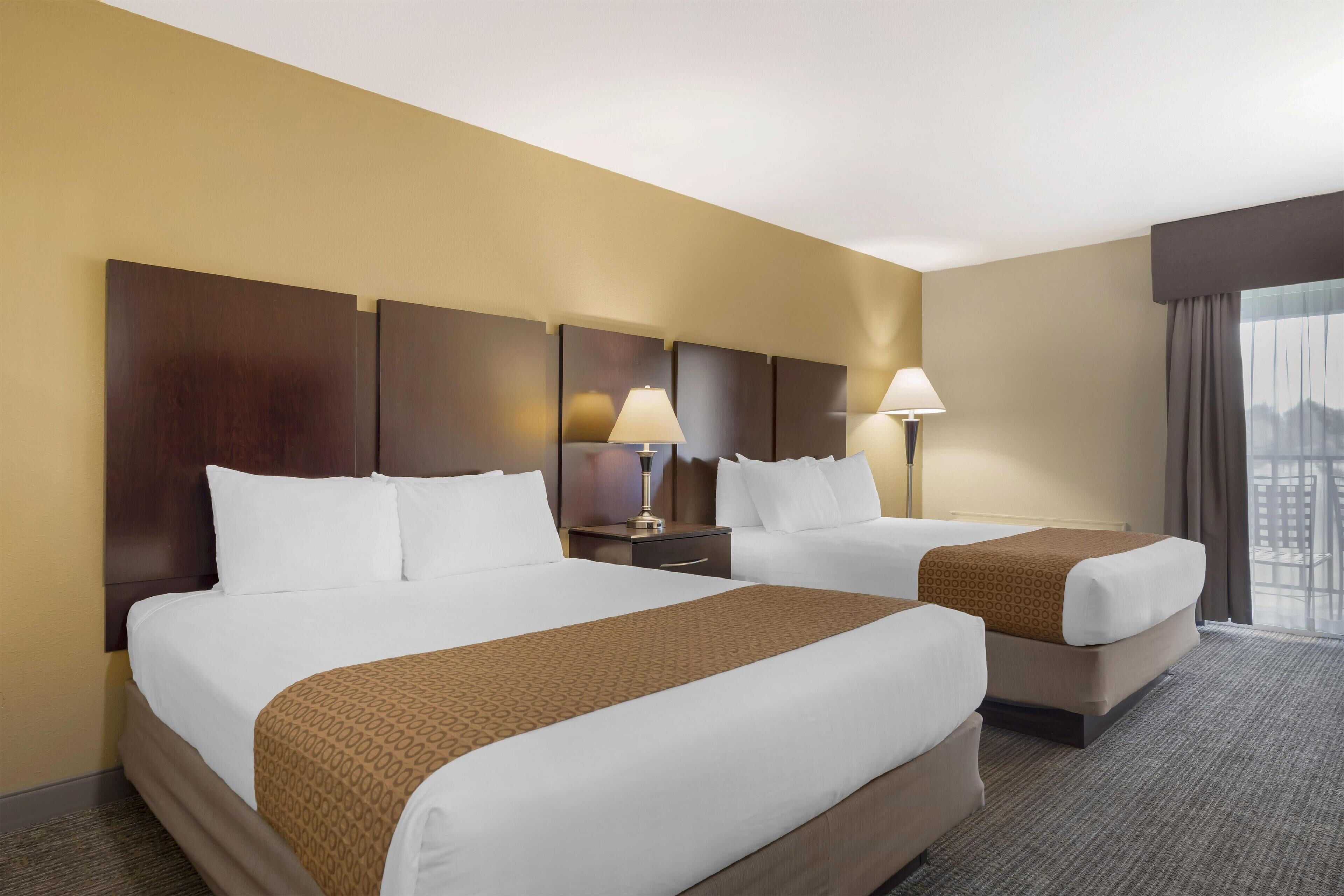 Standard Room, 2 Queen Beds, Balcony, Golf View | Premium bedding, desk, laptop workspace, iron/ironing board