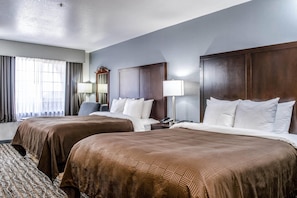 Pillowtop beds, desk, blackout drapes, iron/ironing board