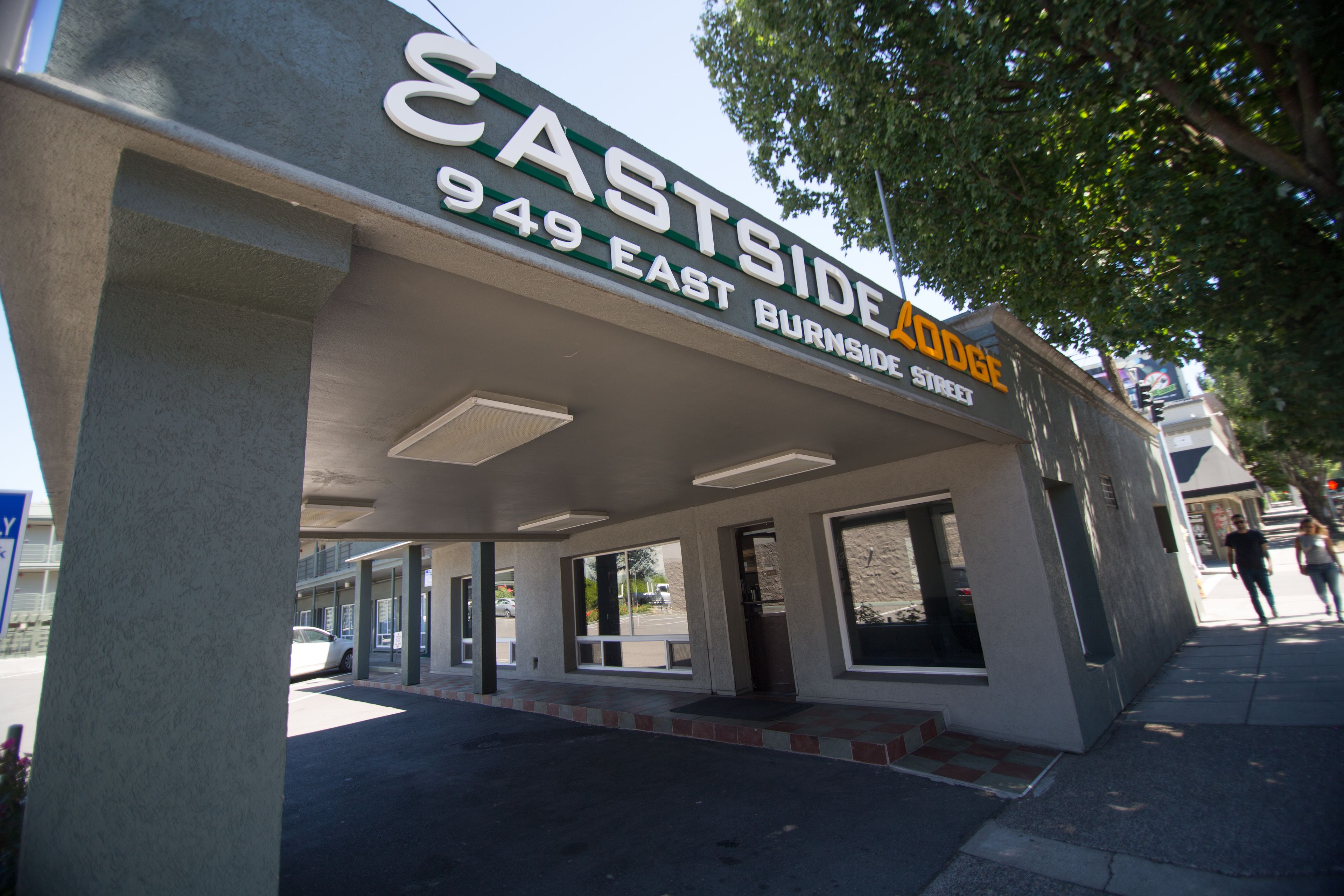 A building with a sign reading "Castside 949 East Burnside Street".