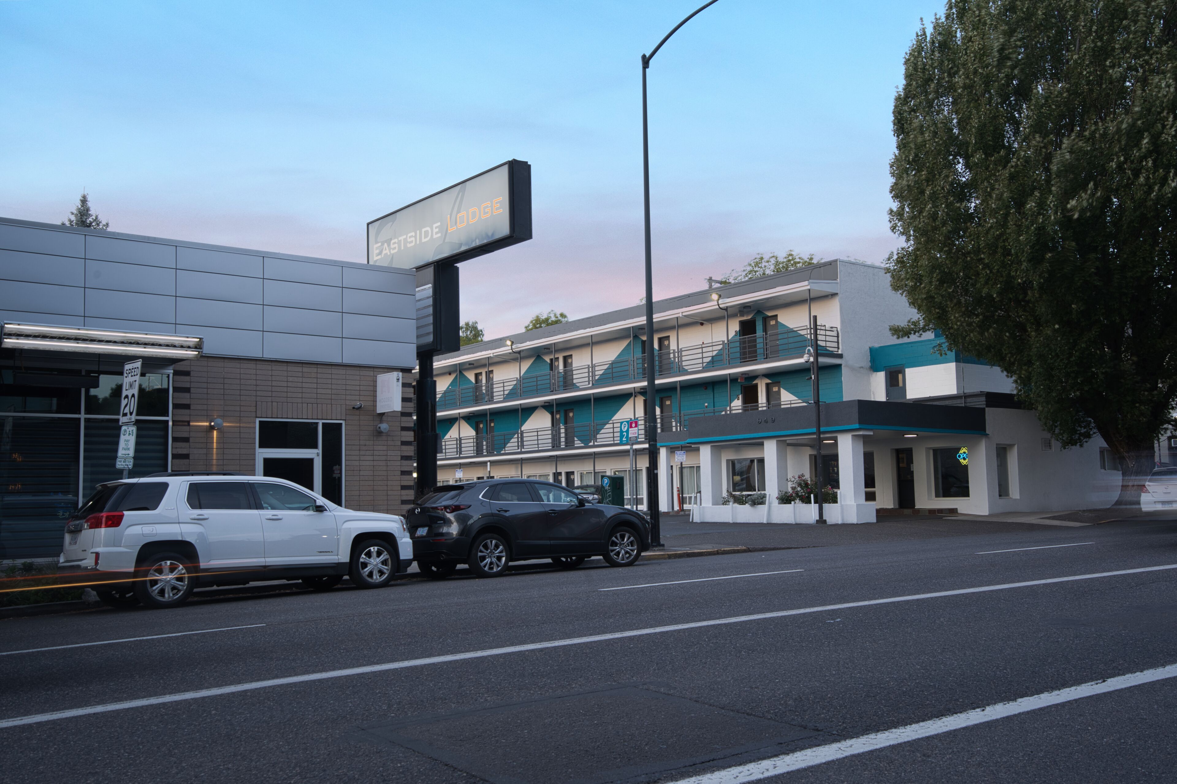 A building with a sign reading "Eastside Lodge."