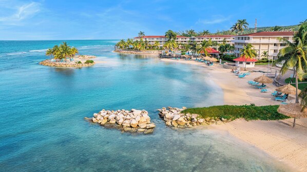 Private beach, white sand, sun loungers, beach towels