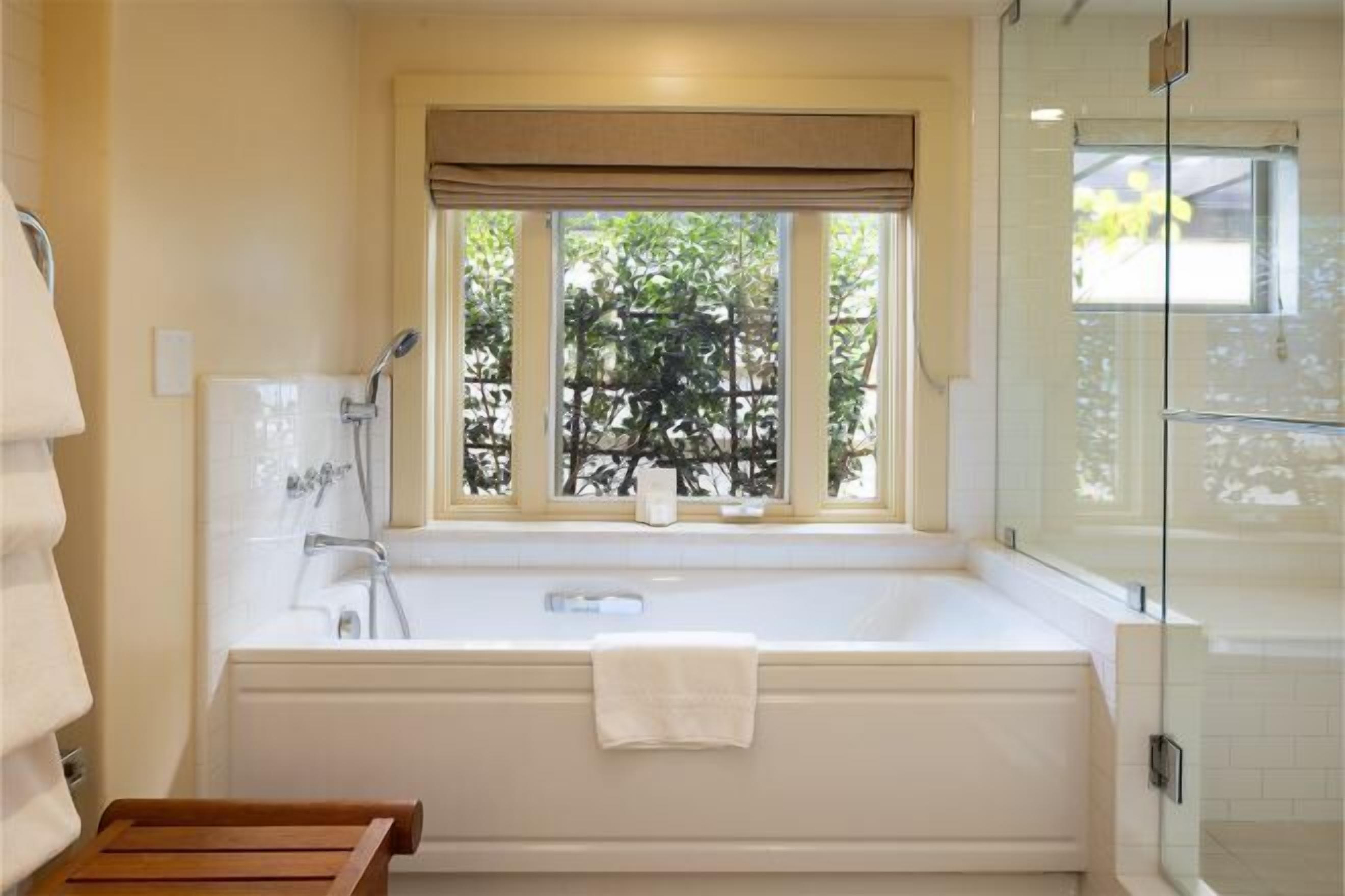 Bathroom | Designer toiletries, hair dryer, bathrobes, slippers