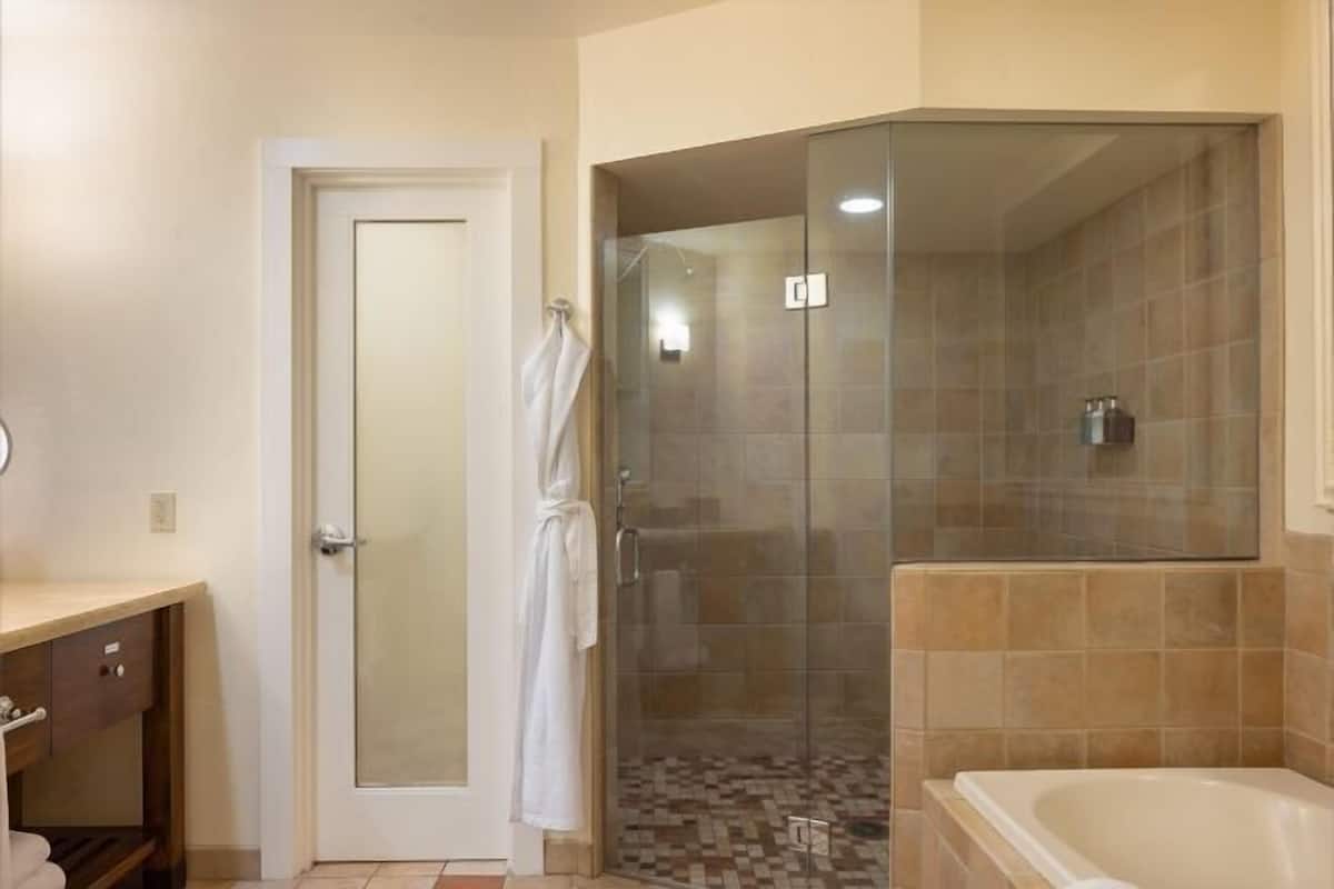 Bathroom | Designer toiletries, hair dryer, bathrobes, slippers