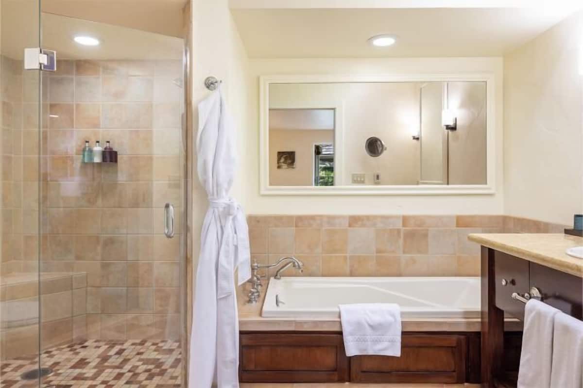 Bathroom | Designer toiletries, hair dryer, bathrobes, slippers