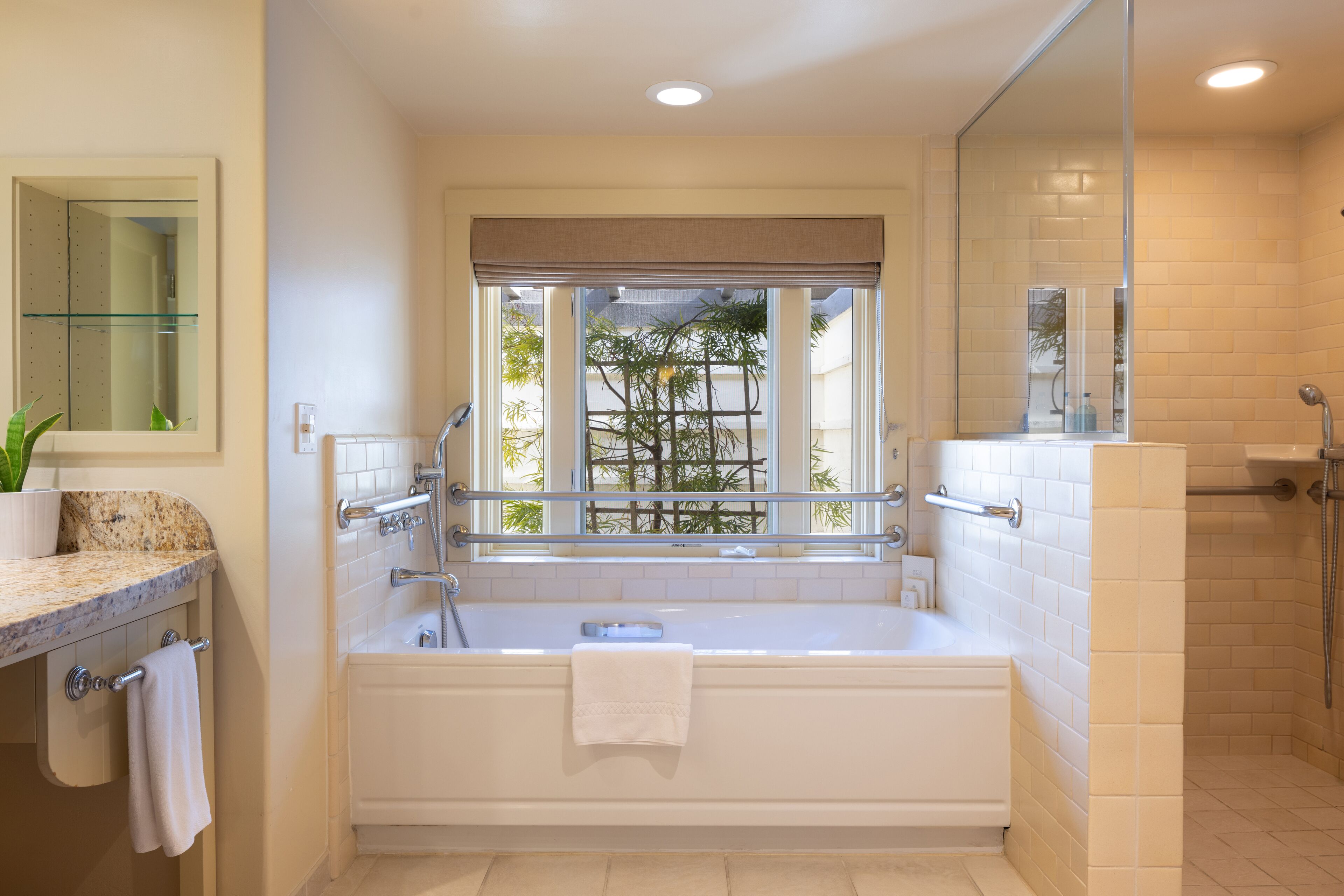 designer toiletries, hair dryer, bathrobes, slippers