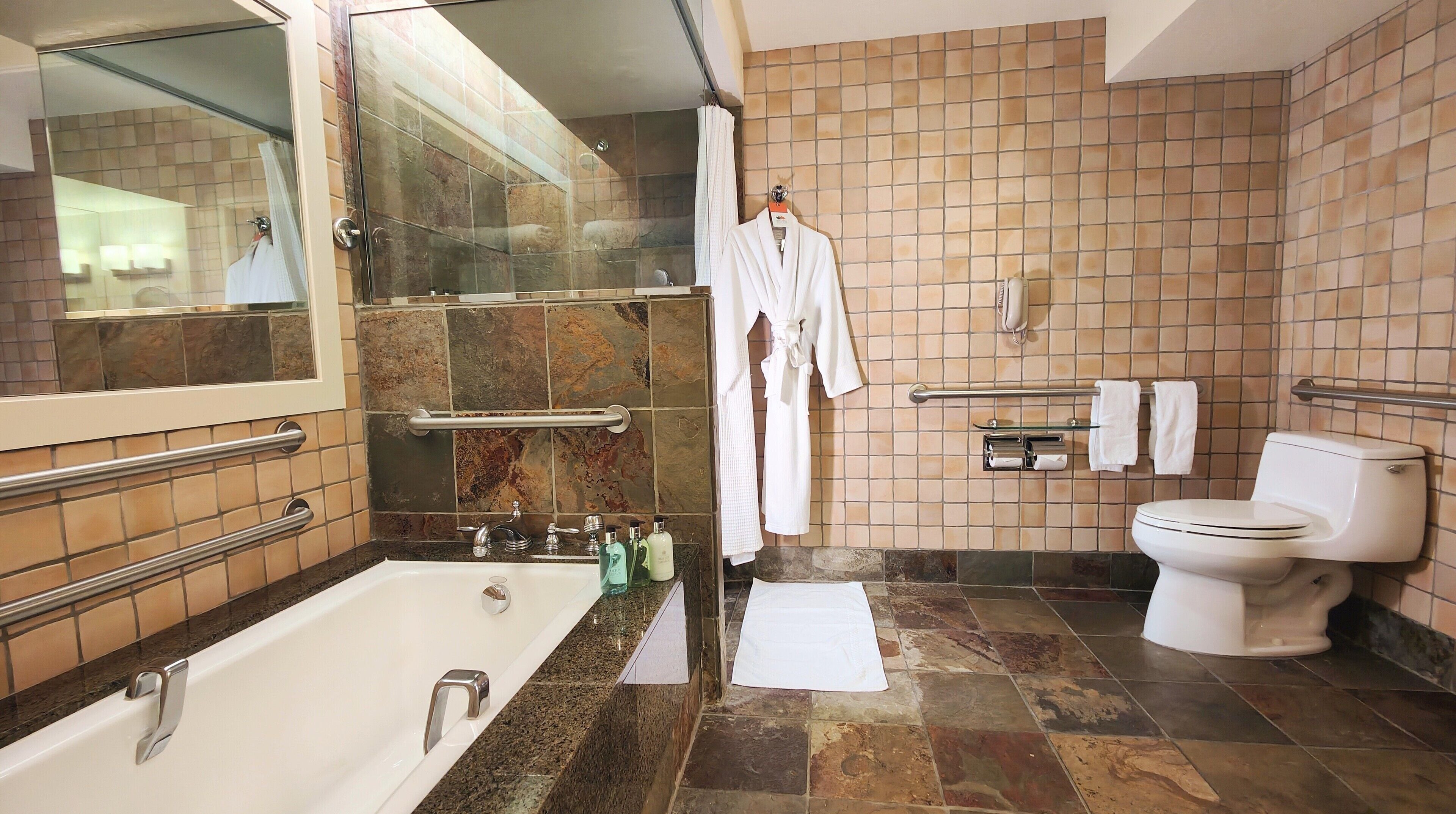 accessible pavilion superior king | bathroom | designer toiletries, hair dryer, bathrobes, slippers