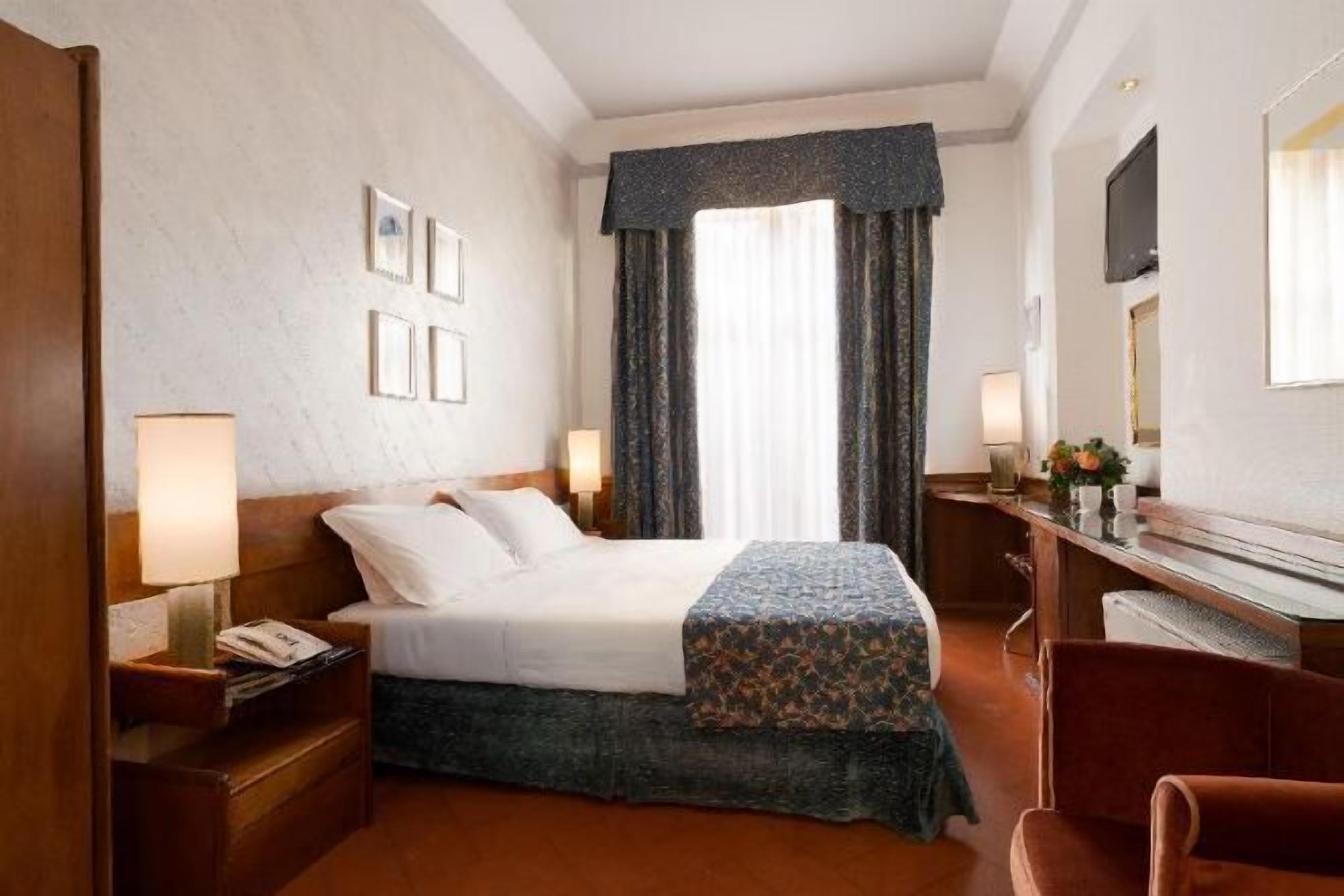 Hypo-allergenic bedding, minibar, in-room safe, desk