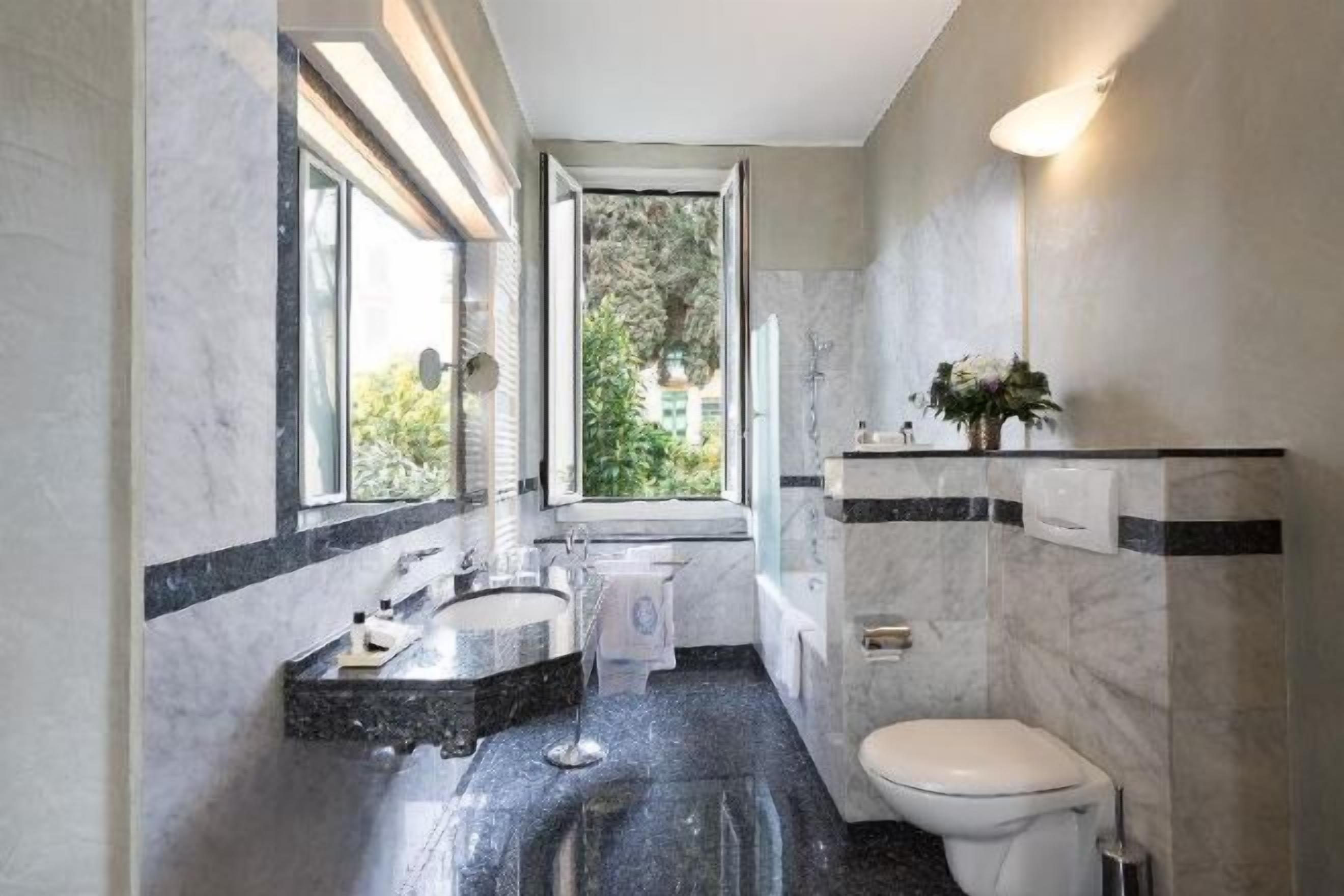 Bathroom | Eco-friendly toiletries, hair dryer, bidet, towels