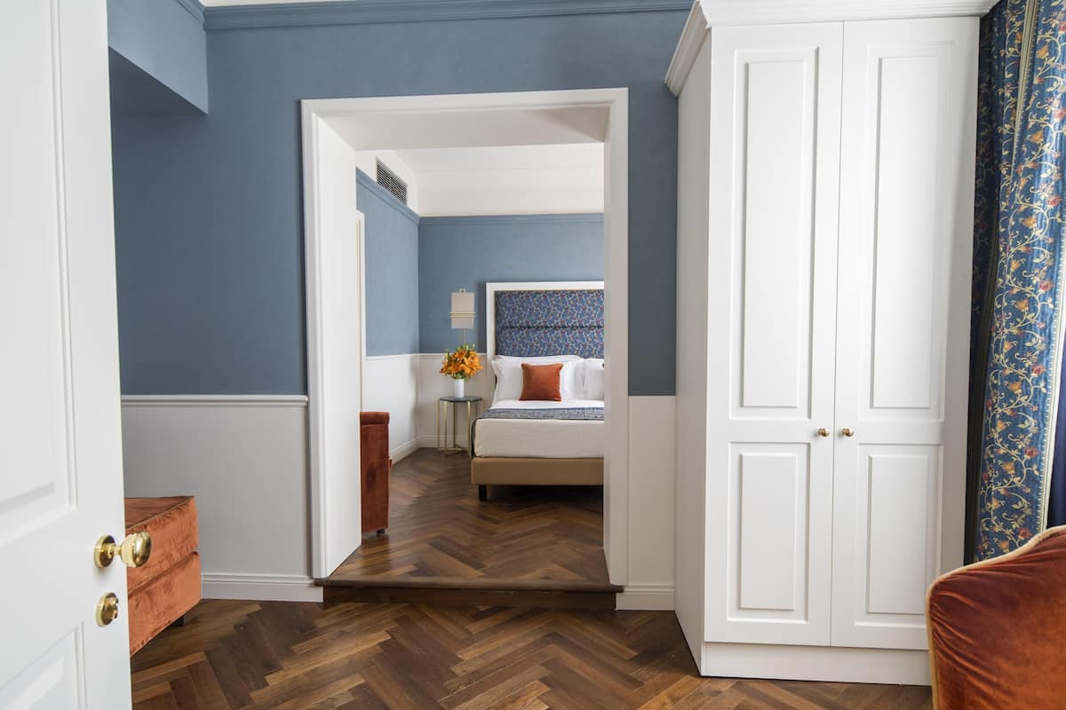 Deluxe Triple Room | Hypo-allergenic bedding, minibar, in-room safe, desk