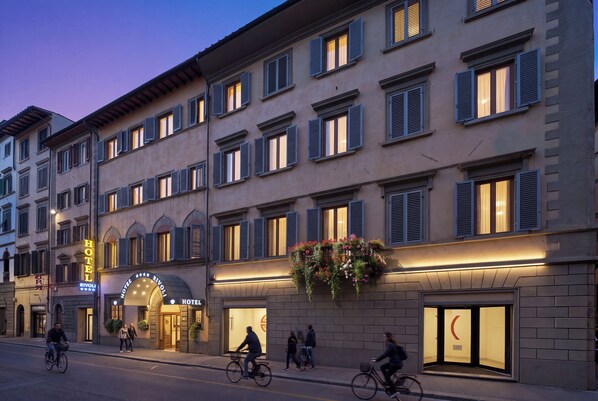 A hotel with a classic facade, multiple windows, and a welcoming entrance. - Rivoli Boutique Hotel (Florence)