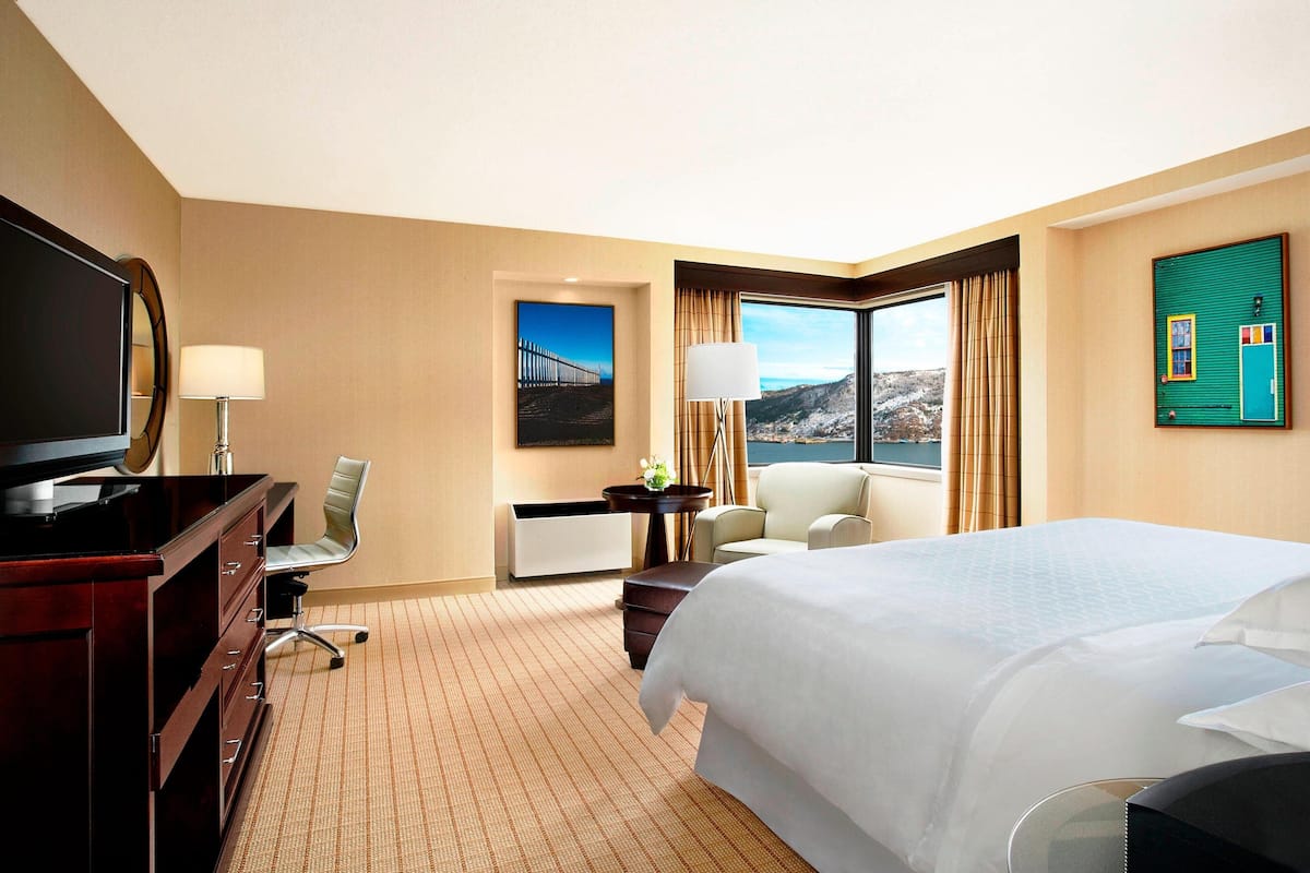 Premium bedding, pillow-top beds, desk, laptop workspace
