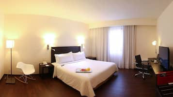 Deluxe Room, 1 King Bed | Premium bedding, in-room safe, desk, blackout curtains