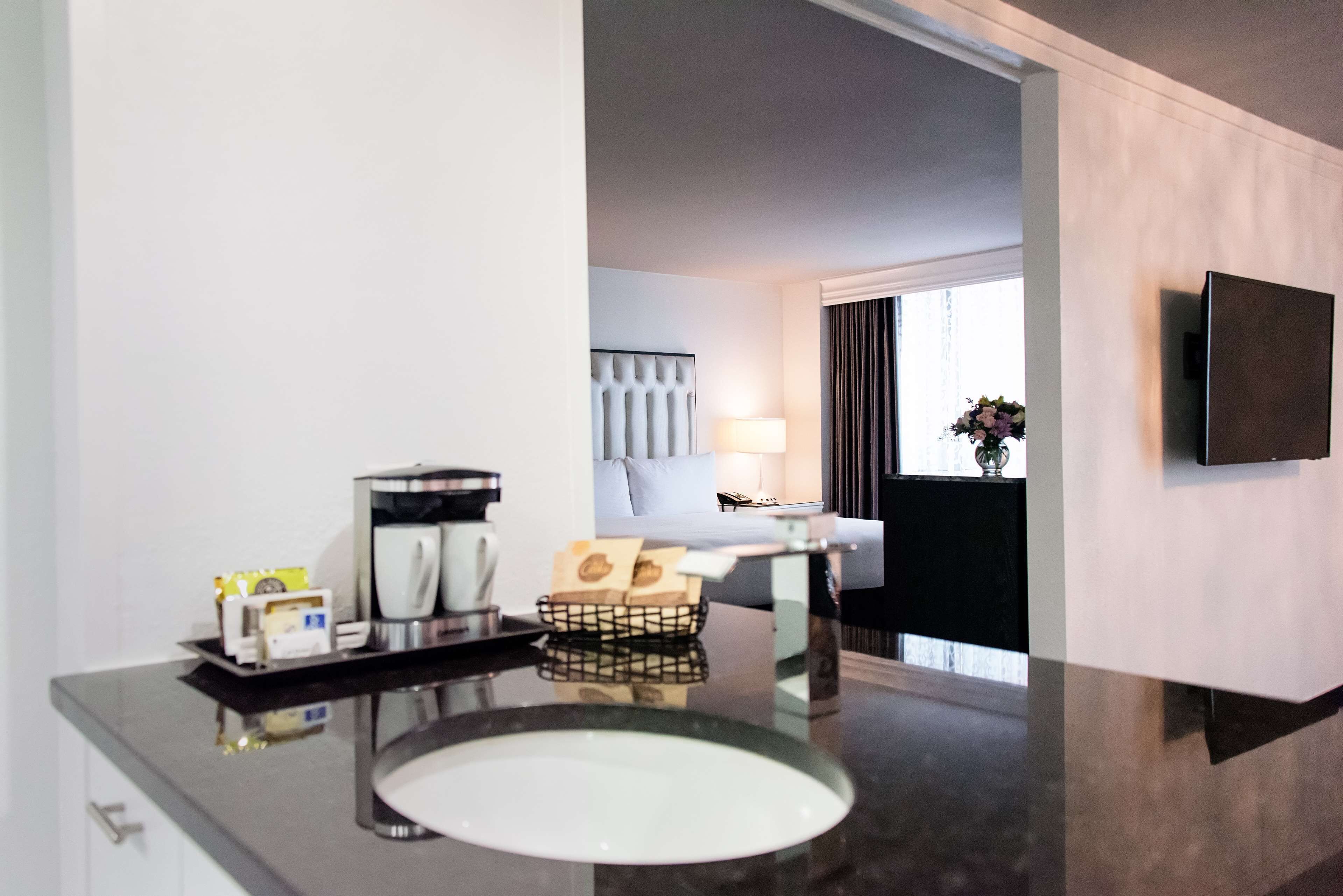 junior suite, 1 king bed | premium bedding, in-room safe, desk, iron/ironing board