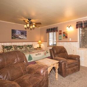 Lodge 3, Jetted Tub | Living area | 50-inch flat-screen TV with cable channels, TV, fireplace