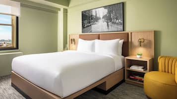 Luxe beddengoed, pillowtop-bedden, een kluis op de kamer, een bureau