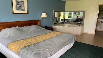 Room, 1 King Bed, Smoking, Jetted Tub | Desk, iron/ironing board, free WiFi, bed sheets