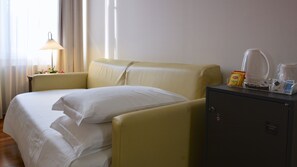 Hypo-allergenic bedding, down comforters, minibar, in-room safe