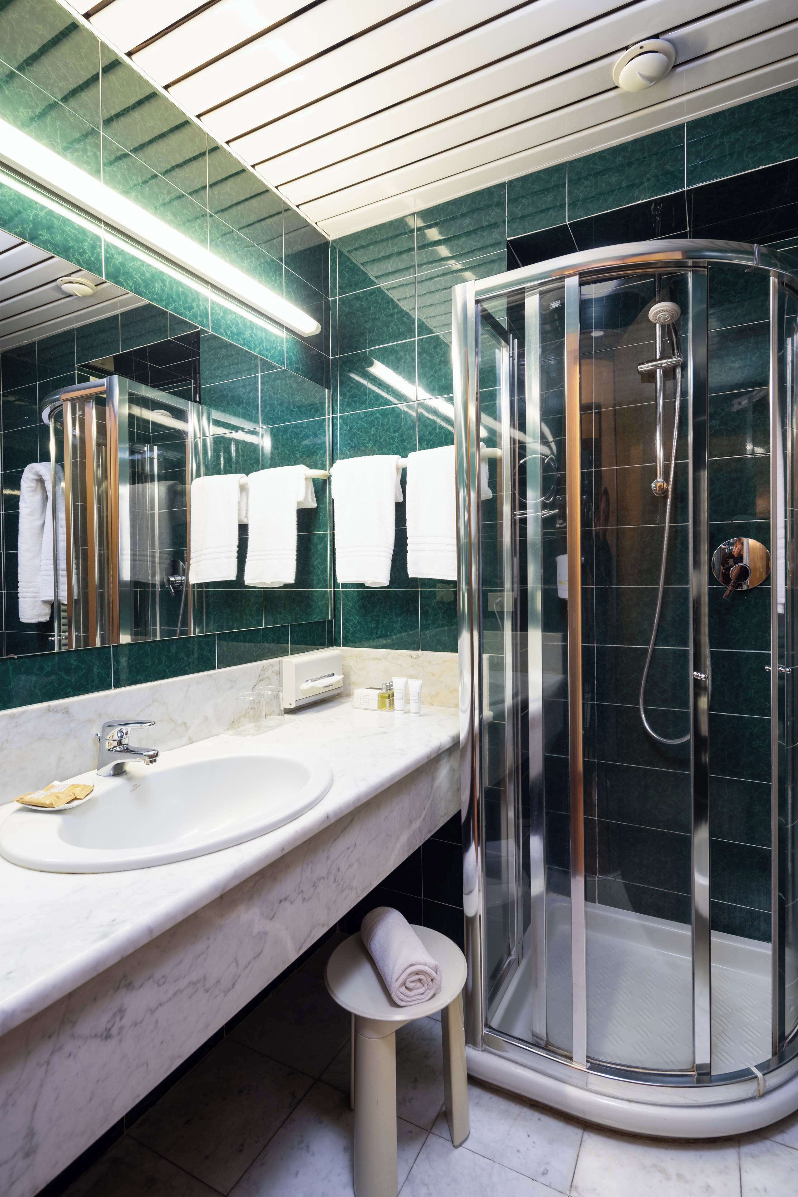 free toiletries, hair dryer, bidet, towels