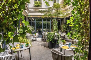 Breakfast, lunch, dinner served; French cuisine, al fresco dining 