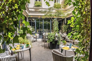 Breakfast, lunch, dinner served; French cuisine, al fresco dining