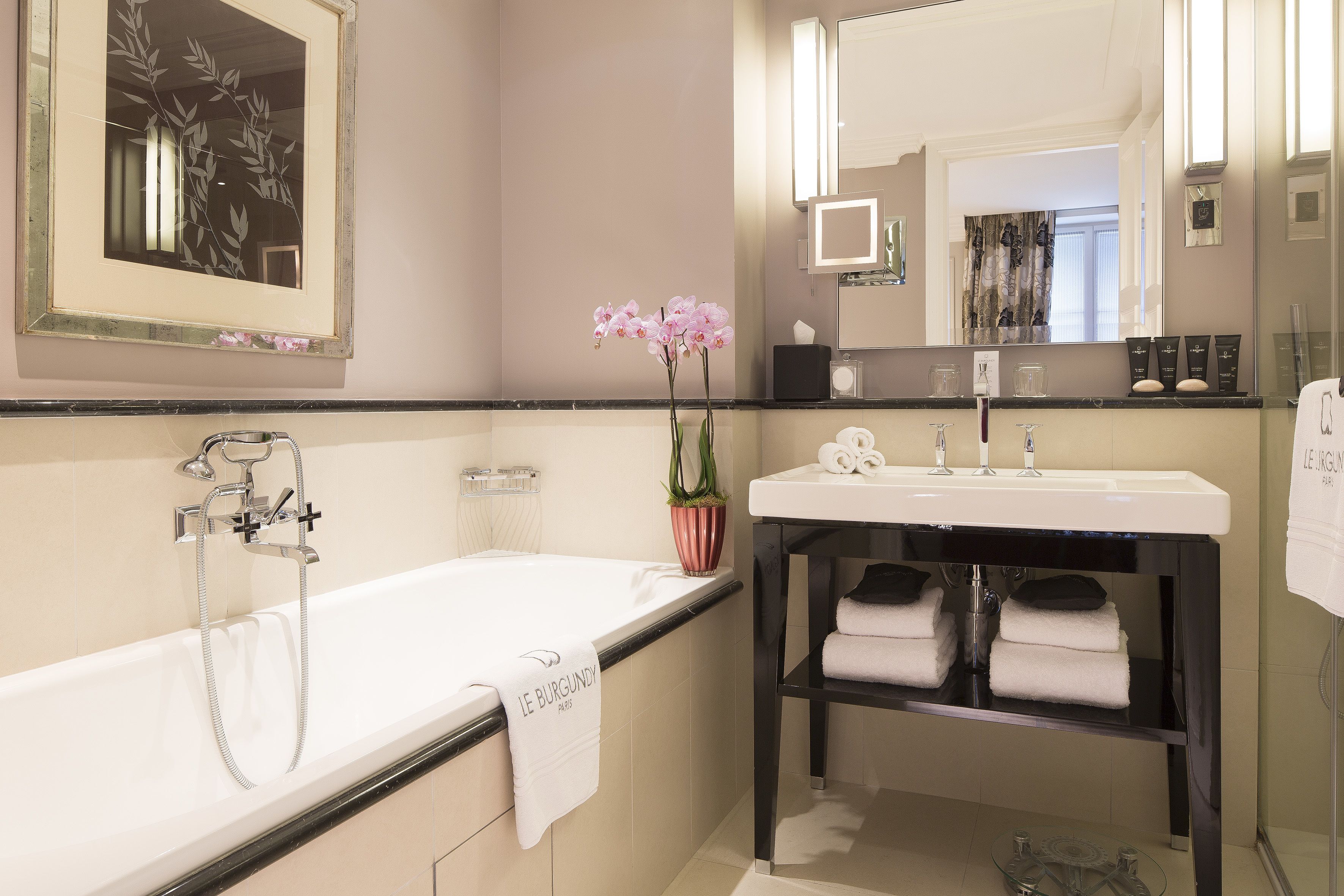 hair dryer, bathrobes, slippers, towels