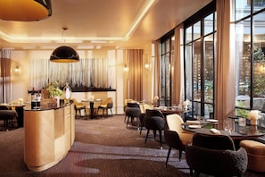 Breakfast, lunch, dinner served; French cuisine, al fresco dining