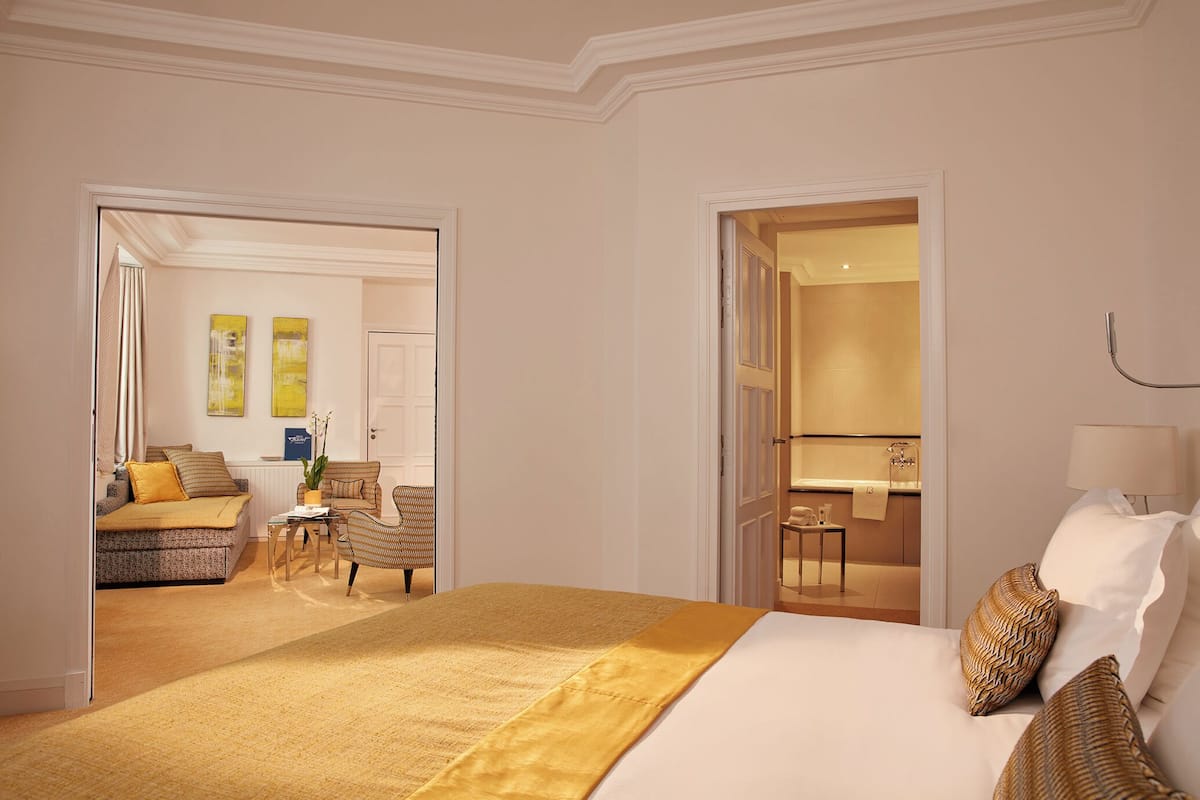 Superior Suite | Living room | 108-cm LED TV with satellite channels, TV, tablet