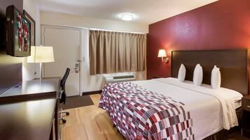 Premium bedding, blackout curtains, free cots/infant beds, free WiFi