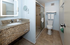 Suite, 1 King Bed (Smoke Free) | Bathroom | Free toiletries, hair dryer, towels, soap