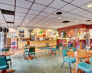 Relax in the hotel lobby, surrounded by comfortable seating and decorative touches.