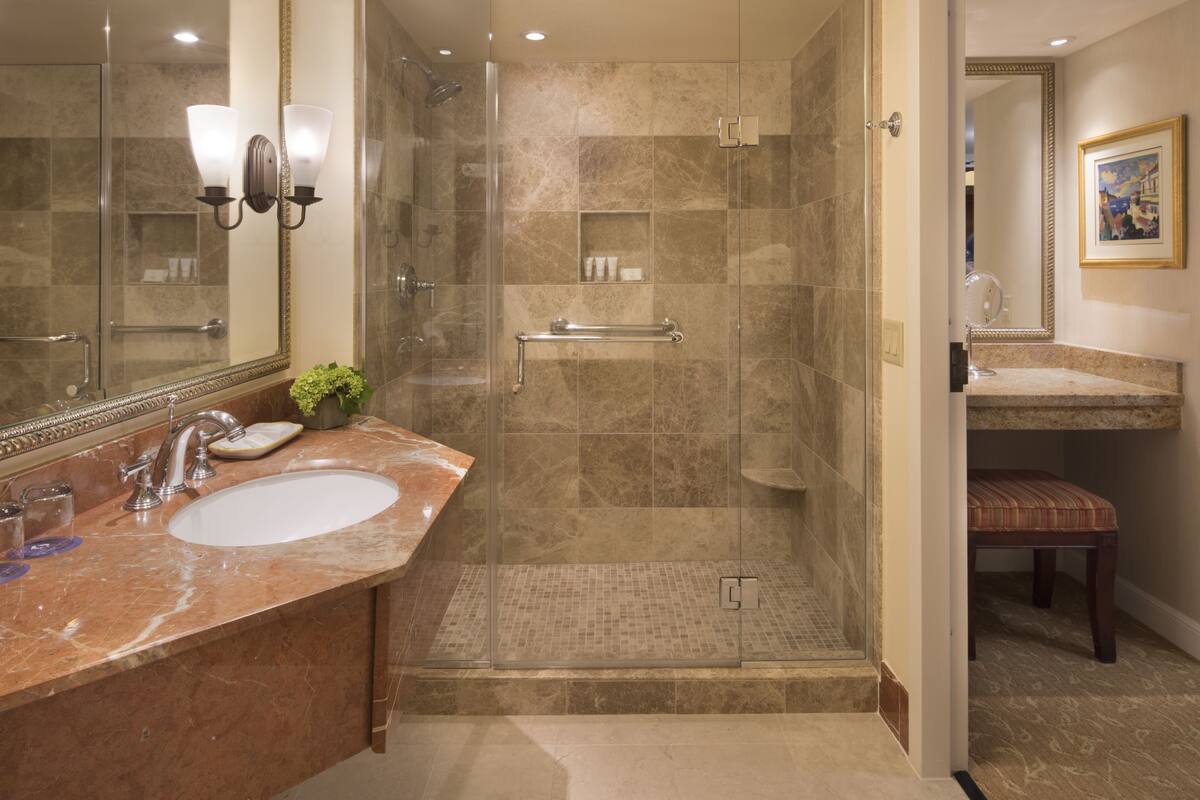 designer toiletries, hair dryer, bathrobes, towels
