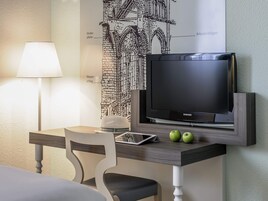 Desk, laptop workspace, blackout drapes, soundproofing