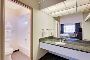 Room, 1 King Bed, Accessible, Non Smoking | Bathroom | Combined shower/bathtub, free toiletries, hair dryer, towels