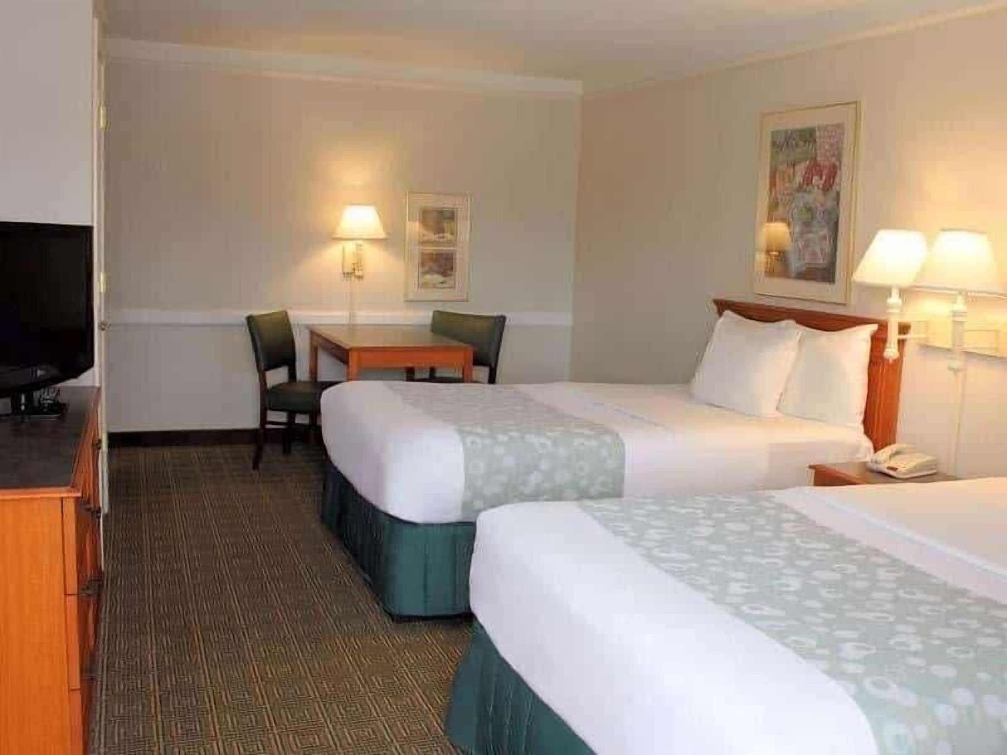 Premium bedding, pillowtop beds, desk, blackout drapes