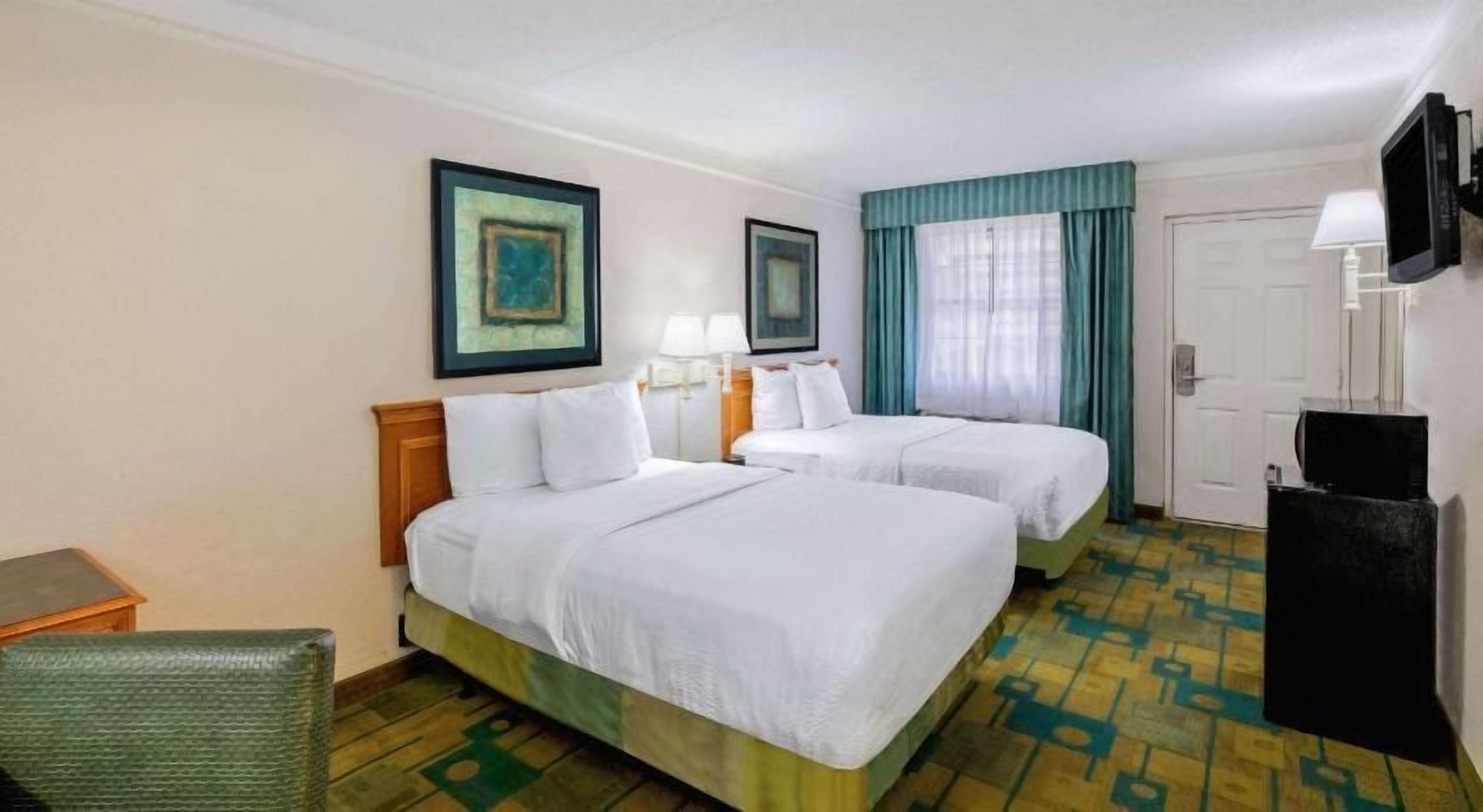 Premium bedding, pillowtop beds, desk, blackout drapes