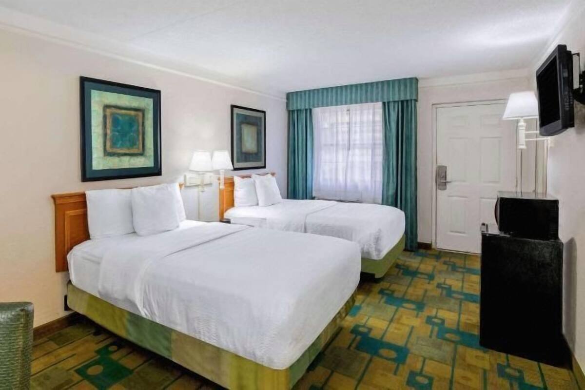 Premium bedding, pillowtop beds, desk, blackout drapes