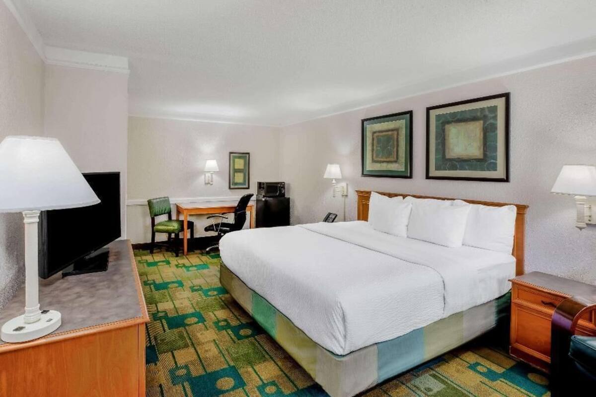 Premium bedding, pillowtop beds, desk, blackout drapes