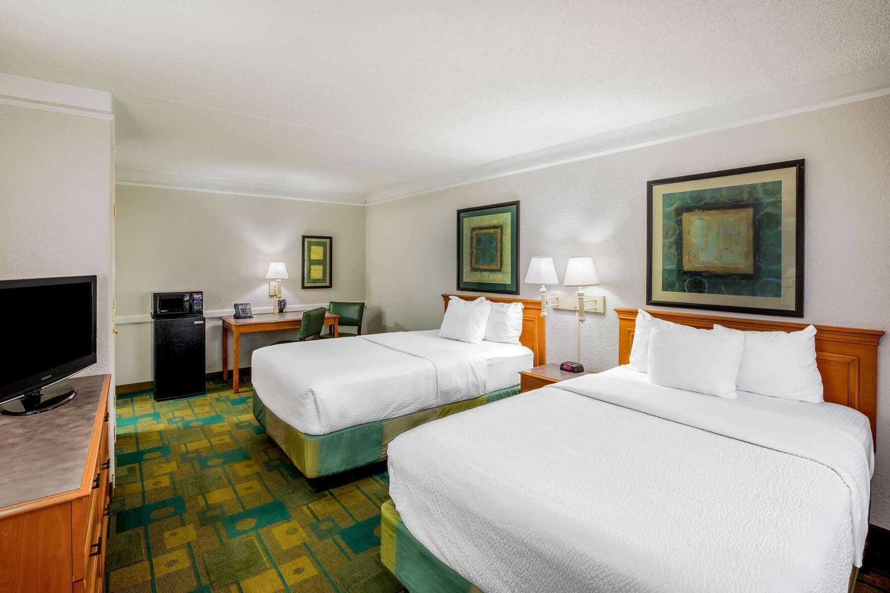 Premium bedding, pillowtop beds, desk, blackout drapes